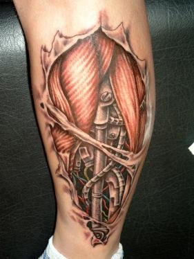 grey-ink-biomechanical-tattoo-on-left-leg